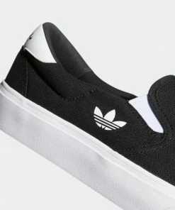 ADIDAS - COURT RALLYE SLIP ON SHOES BLACK/BLACK/WHITE Trucks