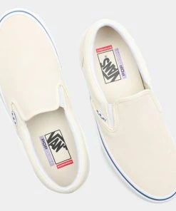 VANS - SKATE SLIP ON SHOES. OFF WHITE/OFF WHITE